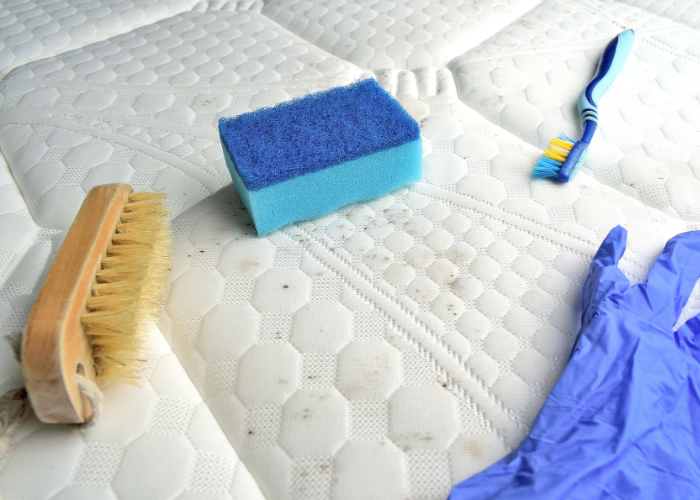 Hoe maak ik mijn matras proper?